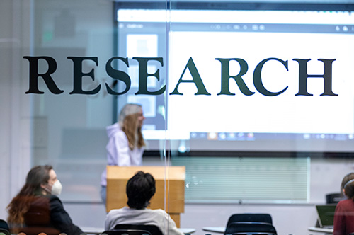 A speaker presents to an audience